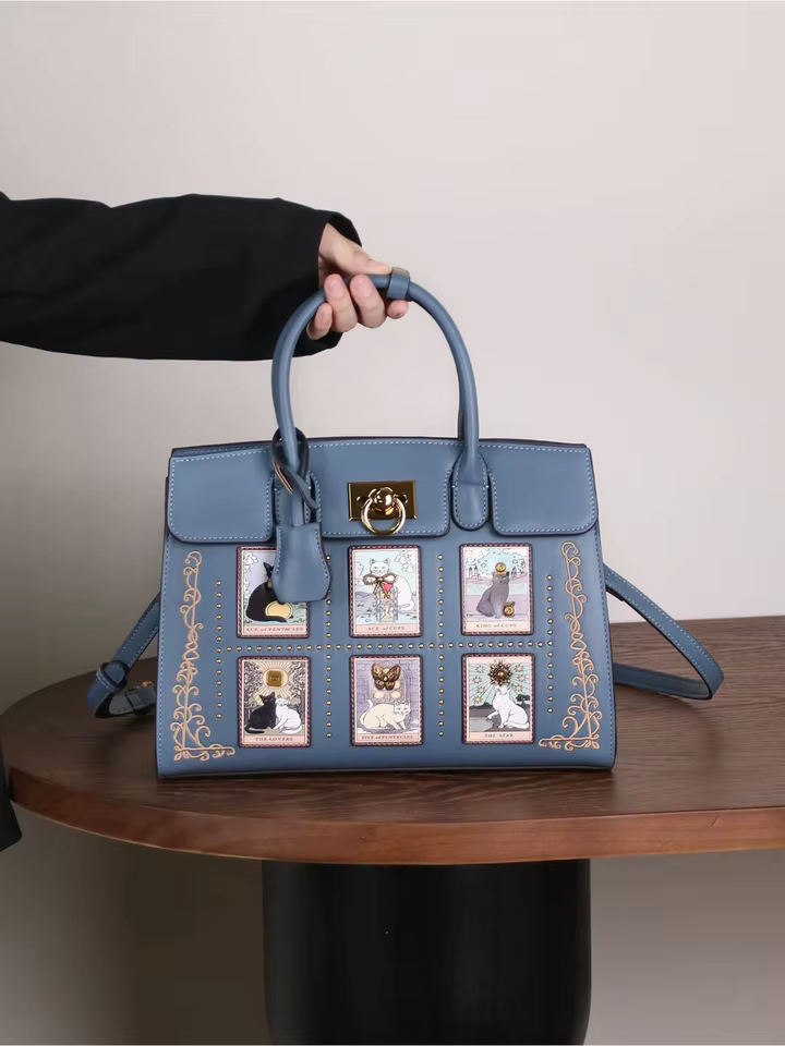 European and American fashion new exquisite cat bear print handbag for ladies to go out with versatile Boston bag